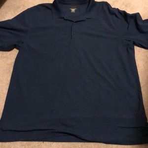 Greg Norman Navy play dry polo golf